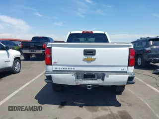 2014 Chevrolet Silverado 1500 LT with VIN 1GCRCREH0EZ355674, listed as a IAAI auction lot 42180931 with 195,496 mi miles and . Bid and sale history available at DreamBid. Image 16.