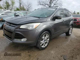 2016 Ford Escape Titanium with VIN 1FMCU0JX6GUA97930, listed as a Copart auction lot 47872654 with 59,834 mi miles and Salvage Title. Bid and sale history available at carsss.com. Image 1.