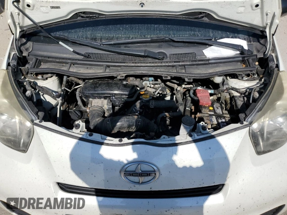 2012 Scion iQ with VIN JTNJJXB06CJ019475, listed as a Copart auction lot 61358615 with 94,194 mi miles and Clean title. Bid and sale history available at DreamBid. Image 11.