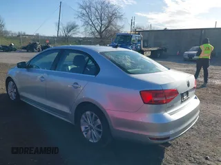 2015 Volkswagen Jetta Sedan 1.8T SE with VIN 3VWD17AJ3FM303470, listed as a IAAI auction lot 41973255 with 90,583 mi miles. Bid and sale history available at carsss.com. Image 3.