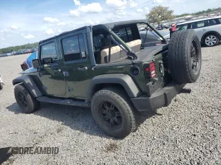 2008 Jeep Wrangler Unlimited X with VIN 1J4GB39108L608465, listed as a Copart auction lot 50949015 with 103,205 mi miles and Salvage Title. Bid and sale history available at DreamBid. Image 2.
