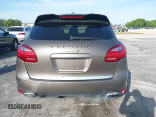 2011 Porsche Cayenne S Hybrid with VIN WP1AE2A29BLA94414, listed as a IAAI auction lot 41644386 with 76,095 mi miles. Bid and sale history available at carsss.com. Image 16.
