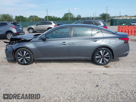 2021 Nissan Altima SV with VIN 1N4BL4DV3MN406320, listed as a IAAI auction lot 42086770 with 118,694 mi miles and . Bid and sale history available at DreamBid. Image 14.