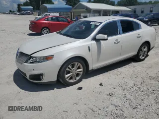 2011 Lincoln MKS with VIN 1LNHL9DR6BG605900, listed as a Copart auction lot 62345685 with 167,003 mi miles and Salvage title. Bid and sale history available at DreamBid. Image 1.