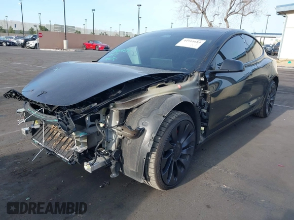 2023 Tesla Model 3 Performance z VIN 5YJ3E1EC3PF716085, wystawiony jako IAAI lot #41911684 z przebiegiem 45 184 mil mil oraz . Historia ofert i sprzedaży dostępna na DreamBid. Obrazek 2.