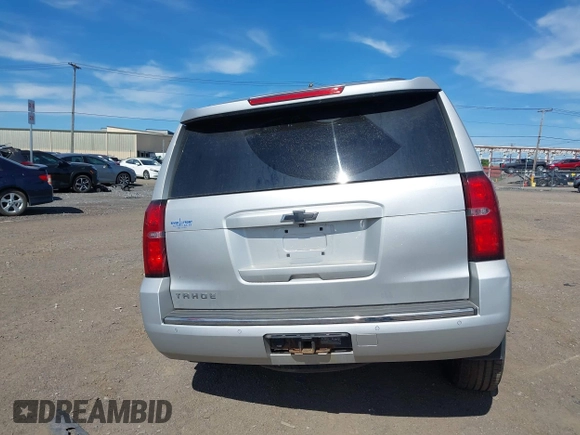 2016 Chevrolet Tahoe LTZ with VIN 1GNSKCKC1GR452600, listed as a IAAI auction lot 42305719 with 121,041 mi miles and . Bid and sale history available at DreamBid. Image 16.