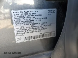 2018 Audi Q7 Premium z VIN WA1AHAF75JD037217, wystawiony jako Copart lot #55182155 z przebiegiem 97 954 mil mil oraz Szkoda całkowita • Salvage title. Historia ofert i sprzedaży dostępna na DreamBid. Obrazek 13.