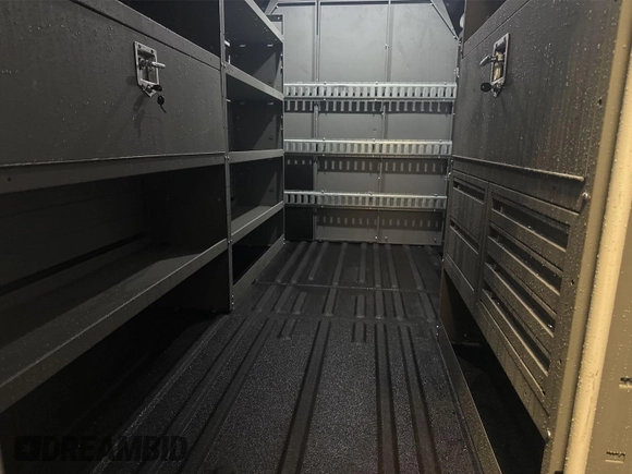 2023 Ford Transit Cargo with VIN 1FTBR1X86PKC09421, listed as a IAAI auction lot 42843981 with 10,233 mi miles and . Bid and sale history available at DreamBid. Image 19.