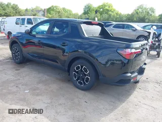 2022 Hyundai Santa Cruz SEL with VIN 5NTJBDAE2NH000464, listed as a IAAI auction lot 42329921 with 32,890 mi miles and . Bid and sale history available at DreamBid. Image 3.