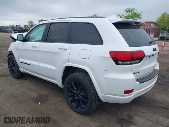 2018 Jeep Grand Cherokee Altitude with VIN 1C4RJFAG1JC202820, listed as a IAAI auction lot 42257958 with 86,117 mi miles and . Bid and sale history available at DreamBid. Image 3.
