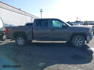 2015 GMC Sierra 1500 SLE with VIN 3GTU2UEC2FG309656, listed as a IAAI auction lot 41922877 with 194,339 mi miles. Bid and sale history available at carsss.com. Image 13.