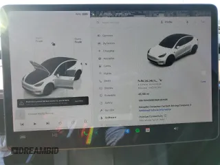 2022 Tesla Model Y Long Range with VIN 7SAYGDEE4NF357428, listed as a Copart auction lot 50345715 with 45,168 mi miles and Salvage Title. Bid and sale history available at carsss.com. Image 9.