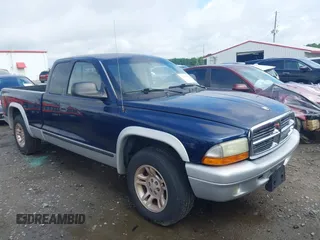 2004 Dodge Dakota SLT with VIN 1D7GL42K84S548808, listed as a IAAI auction lot 42387628 with 244,744 mi miles and . Bid and sale history available at DreamBid. Image 1.