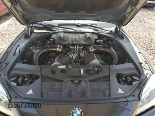 2016 BMW M6 z VIN WBS6J9C51GD934487, wystawiony jako Copart lot #45756775 z przebiegiem 62 179 mil mil oraz Szkoda całkowita • Salvage title. Historia ofert i sprzedaży dostępna na DreamBid. Obrazek 11.