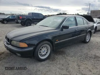 1999 BMW 5 Series 528iA with VIN WBADM6345XGU01081, listed as a Copart auction lot 82130524 with 227,118 mi miles and Clean Title. Bid and sale history available at carsss.com. Image 1.