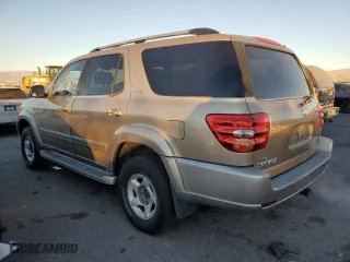 2001 Toyota Sequoia SR5 with VIN 5TDZT34AX1S048641, listed as a Copart auction lot 87735665 with 247,086 mi miles and Salvage Title. Bid and sale history available at carsss.com. Image 2.