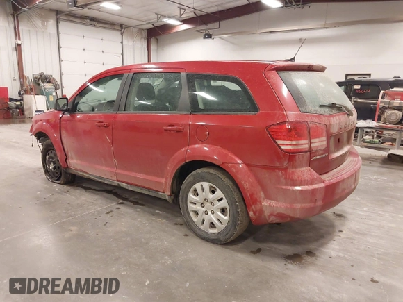 2015 Dodge Journey American Value z VIN 3C4PDCAB5FT720300, wystawiony jako IAAI lot #42074690 z przebiegiem 144 690 mil mil oraz . Historia ofert i sprzedaży dostępna na DreamBid. Obrazek 3.