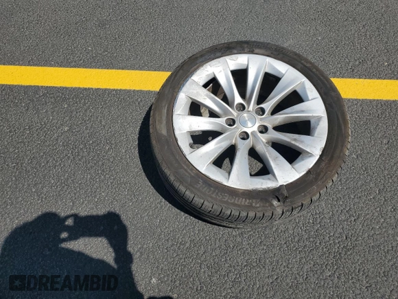 2016 Tesla Model S 90D with VIN 5YJSA1E26GF150180, listed as a Copart auction lot 59776265 with 141,218 mi miles and Salvage title. Bid and sale history available at DreamBid. Image 12.