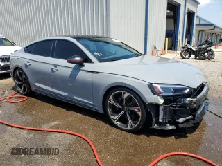 2019 Audi RS 5 Sportback z VIN WUABWCF5XKA907964, wystawiony jako Copart lot #60002343 z przebiegiem 27 182 mil mil oraz . Historia ofert i sprzedaży dostępna na DreamBid. Obrazek 4.