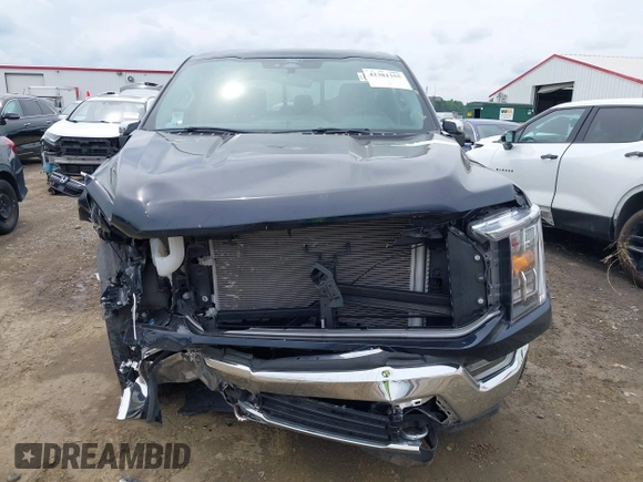 2022 Ford F-150 XL with VIN 1FTFW1E5XNKD93407, listed as a IAAI auction lot 42381355 with 26,816 mi miles and . Bid and sale history available at DreamBid. Image 13.