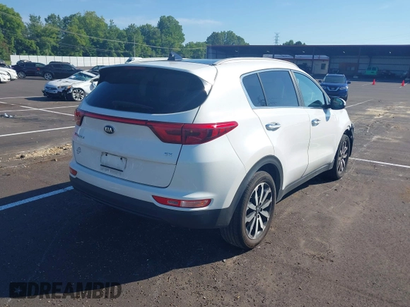 2017 Kia Sportage EX with VIN KNDPN3AC9H7077804, listed as a IAAI auction lot 42632194 with 134,027 mi miles and . Bid and sale history available at DreamBid. Image 4.