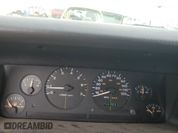 1997 Jeep Grand Cherokee Laredo with VIN 1J4GZ58S2VC676652, listed as a Copart auction lot 64939974 with 256,923 mi miles and Salvage Title. Bid and sale history available at carsss.com. Image 9.