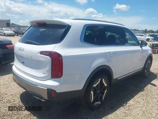 2025 Kia Telluride S with VIN 5XYP6DGC0SG590900, listed as a IAAI auction lot 42706596 with 6,712 mi miles and . Bid and sale history available at DreamBid. Image 4.