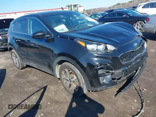 2020 Kia Sportage LX with VIN KNDPM3ACXL7808431, listed as a IAAI auction lot 41614114 with 123,400 mi miles. Bid and sale history available at carsss.com. Image 1.