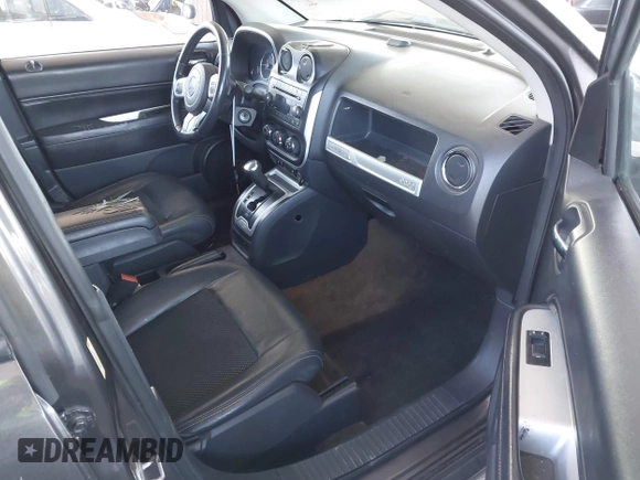 2016 Jeep Compass Latitude with VIN 1C4NJDEB2GD685383, listed as a IAAI auction lot 41968450 with 273,938 mi miles. Bid and sale history available at carsss.com. Image 5.