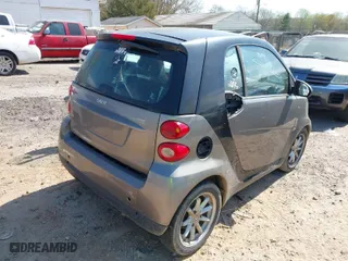 2009 Smart fortwo Pure with VIN WMEEJ31X99K302227, listed as a IAAI auction lot 41900573 with 30,730 mi miles. Bid and sale history available at carsss.com. Image 4.