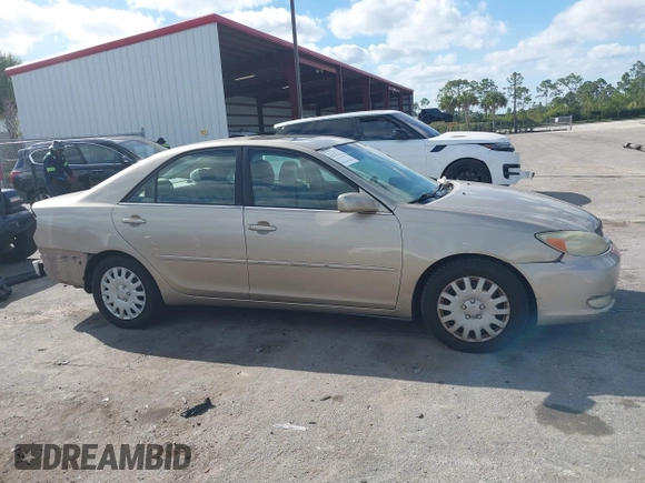 2003 Toyota Camry LE with VIN 4T1BE30K83U176834, listed as a IAAI auction lot 41307922 with 182,019 mi miles and . Bid and sale history available at DreamBid. Image 13.