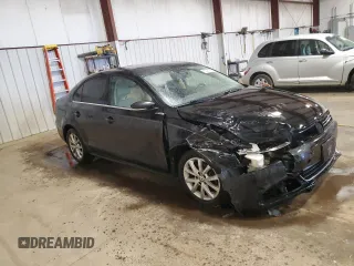 2014 Volkswagen Jetta SE with VIN 3VWD17AJ6EM387167, listed as a Copart auction lot 52251955 with 150,441 mi miles and Salvage title. Bid and sale history available at DreamBid. Image 4.