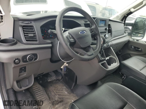2023 Ford Transit Cargo with VIN 1FTBR1C83PKA24362, listed as a Copart auction lot 58766595 with 7,047 mi miles and Salvage title. Bid and sale history available at DreamBid. Image 8.