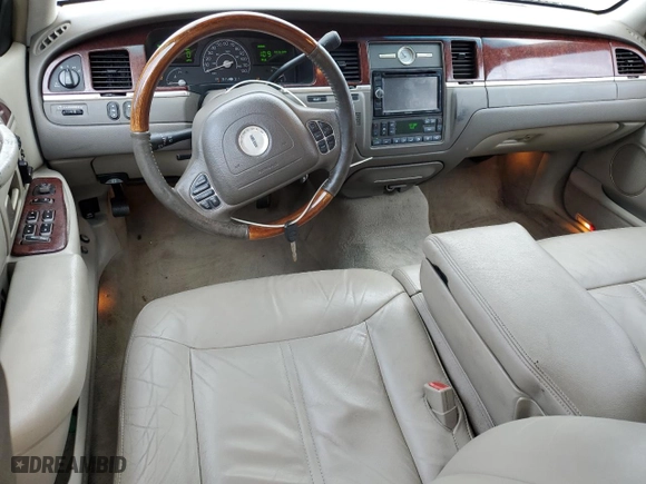2003 Lincoln Town Car Cartier with VIN 1LNHM83W23Y639990, listed as a Copart auction lot 85591924 with 124,515 mi miles and Salvage Title. Bid and sale history available at carsss.com. Image 8.