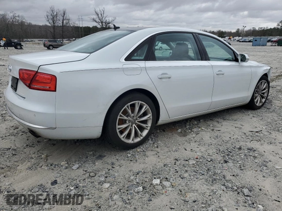 2014 Audi A8 3.0T z VIN WAURGAFD3EN003758, wystawiony jako Copart lot #47636885 z przebiegiem 166 990 mil mil oraz Szkody całkowita. Historia ofert i sprzedaży dostępna na DreamBid. Obrazek 3.