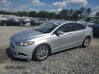 2017 Ford Fusion SE z VIN 3FA6P0H74HR164747, wystawiony jako Copart lot #56139855 z przebiegiem 105 769 mil mil oraz Szkoda całkowita • Salvage title. Historia ofert i sprzedaży dostępna na DreamBid. Obrazek 1.