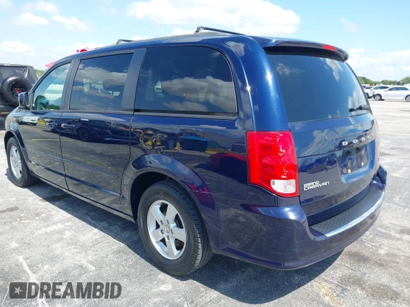 2013 Dodge Grand Caravan SXT with VIN 2C4RDGCG3DR611519, listed as a IAAI auction lot 42237571 with 156,858 mi miles and . Bid and sale history available at DreamBid. Image 3.