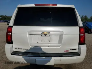 2017 Chevrolet Suburban Premier with VIN 1GNSCJKCXHR348044, listed as a Copart auction lot 55957535 with 112,131 mi miles and Salvage title. Bid and sale history available at DreamBid. Image 6.