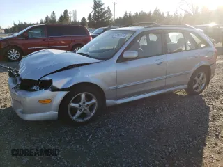 2002 Mazda Protege with VIN JM1BJ246621487010, listed as a Copart auction lot 47055015 with 282,806 mi miles and Salvage Title. Bid and sale history available at DreamBid. Image 1.