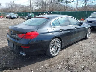 2013 BMW 6 Series 650i xDrive with VIN WBA6B4C53DD098536, listed as a IAAI auction lot 41825107 with 999,999 mi miles. Bid and sale history available at carsss.com. Image 4.