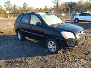 2009 Kia Sportage LX with VIN KNDJE723397585036, listed as a IAAI auction lot 41331868 with 208,268 mi miles and . Bid and sale history available at carsss.com. Image 1.