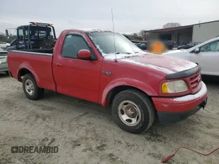 2000 Ford F-150 XL with VIN 2FTZF1726YCA76913, listed as a Copart auction lot 41915355 with 210,573 mi miles and Clean title. Bid and sale history available at DreamBid. Image 4.