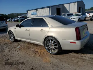 2007 Cadillac STS z VIN 1G6DW677970151227, wystawiony jako Copart lot #52345265 z przebiegiem 154 790 mil mil oraz Szkoda całkowita • Salvage title. Historia ofert i sprzedaży dostępna na DreamBid. Obrazek 2.