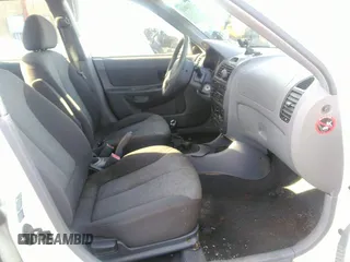 2004 Hyundai Accent GL with VIN KMHCG45C04U498939, listed as a IAAI auction lot 41384821 with 247,994 mi miles. Bid and sale history available at carsss.com. Image 5.