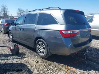 2013 Honda Odyssey EX-L with VIN 5FNRL5H66DB041471, listed as a IAAI auction lot 41543113 with 171,612 mi miles. Bid and sale history available at carsss.com. Image 3.