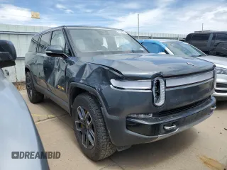 2023 Rivian R1S Adventure z VIN 7PDSGABA3PN018823, wystawiony jako Copart lot #53184595 z przebiegiem 36 677 mil mil oraz Szkoda całkowita • Salvage title. Historia ofert i sprzedaży dostępna na DreamBid. Obrazek 4.