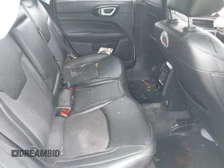2023 Jeep Compass Latitude with VIN 3C4NJDBN3PT510424, listed as a IAAI auction lot 42385491 with 58,640 mi miles and . Bid and sale history available at DreamBid. Image 8.