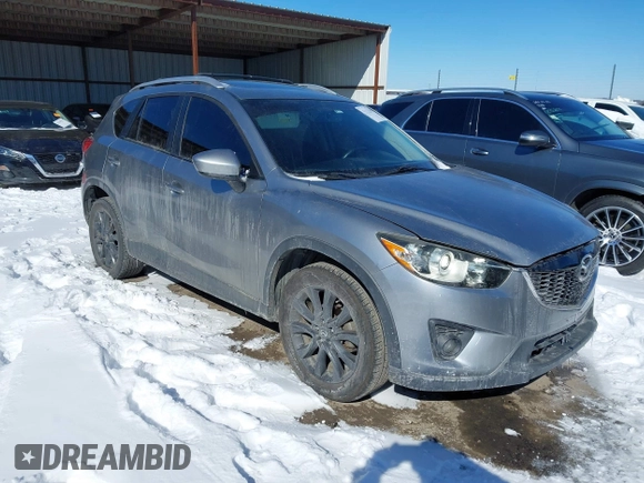 2013 Mazda CX-5 Grand Touring with VIN JM3KE4DE4D0168115, listed as a IAAI auction lot 41610004 with 190,690 mi miles. Bid and sale history available at carsss.com. Image 1.