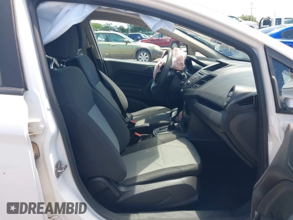 2016 Ford Fiesta S with VIN 3FADP4TJ9GM185722, listed as a IAAI auction lot 42436083 with 69,256 mi miles and . Bid and sale history available at DreamBid. Image 5.