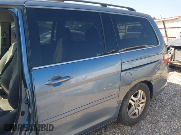 2005 Honda Odyssey EX with VIN 5FNRL38465B059893, listed as a IAAI auction lot 42790058 with 257,143 mi miles and . Bid and sale history available at DreamBid. Image 6.